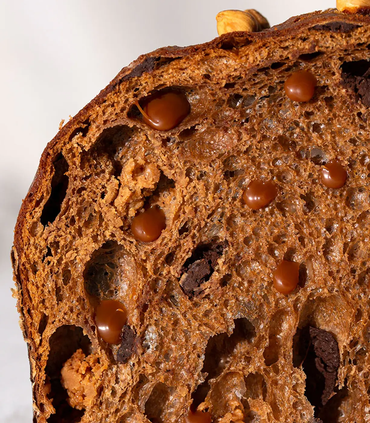 Artisanal panettone filled with gianduia and chocolate